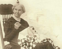 Historic photograph of a woman quilting  In upcoming book by Janet E. Finley, Schiffer Publishing,  Atglen, Pennsylvania; late 2012 Collection of Janet E. Finley