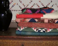 Stack of quilts Susan Parrett and Rod Lich  Georgetown, Indiana