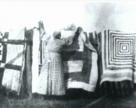 African American quilts, vicinity of the Alabama River  (possibly Gee\'s Bend), Wilcox County, Alabama c. 1900 From Gee\'s Bend: The Architecture of the Quilt Paul Arnett, Tinwood Books, 2006  Courtesy of Matt Arnett Photo by Edith Morgan