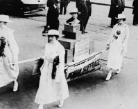 Four women carrying ballot boxes on a stretcher during a  suffrage parade in New York City, New York Oct. 23, 1915 Library of Congress Prints & Photographs Division  Bain Collection Washington, D.C. Item number LC-USZ62-132968 www.loc.gov/pictures