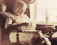 Historic photograph of a woman hand-sewing In upcoming book by Janet E. Finley Schiffer Publishing, Atglen, Pennsylvania; late 2012 Collection of Janet E. Finley