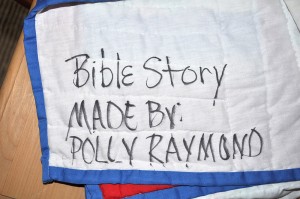 A picture of the Polly Raymond inscription on the back of the quilt
